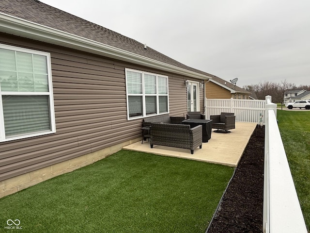 exterior space with a yard, a patio, and an outdoor hangout area