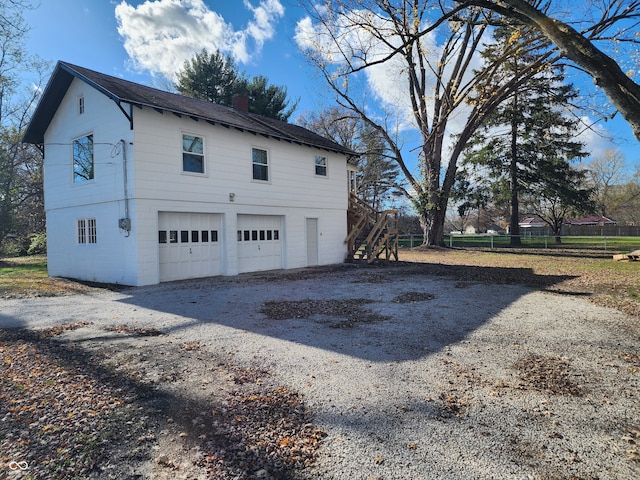 view of home's exterior with a garage