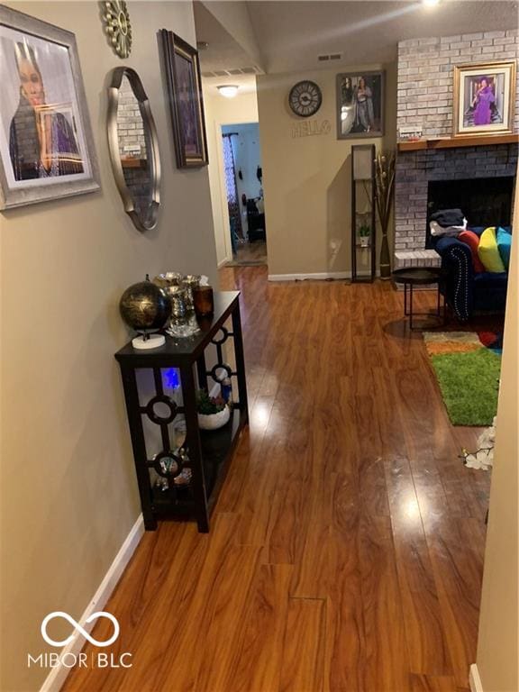 hallway featuring wood-type flooring