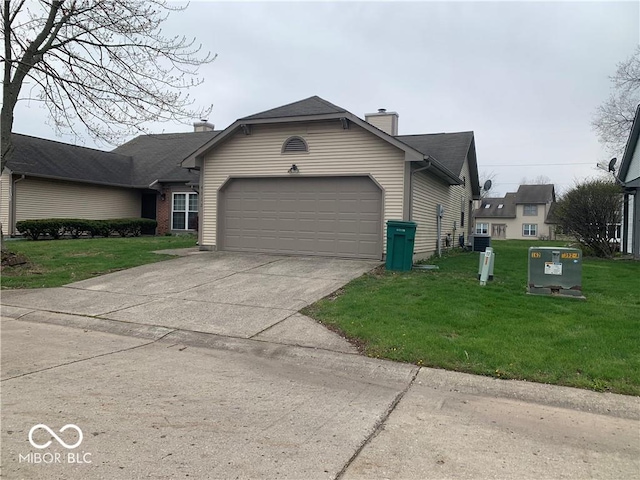4112 Eagle Cove E Drive, Indianapolis, IN 46254 - view of front facade with a garage, a front yard, a chimney, and driveway