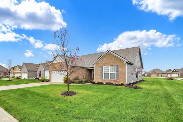 view of front of home with a garage and a front lawn