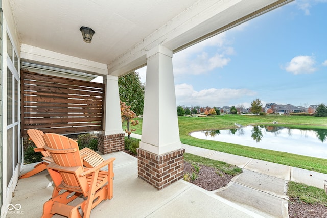 view of patio / terrace featuring a water view