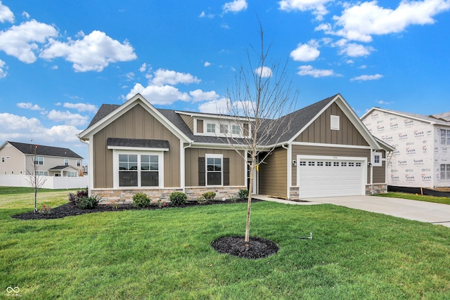7098 Sterling Way, Brownsburg, IN 46112 - craftsman-style home with stone siding, board and batten siding, a garage, concrete driveway, and roof with shingles