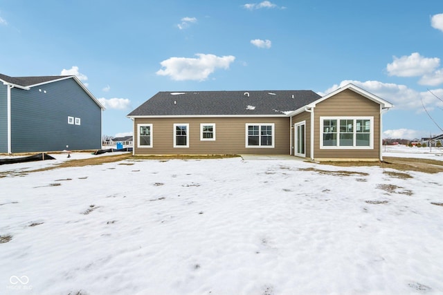 view of snow covered property