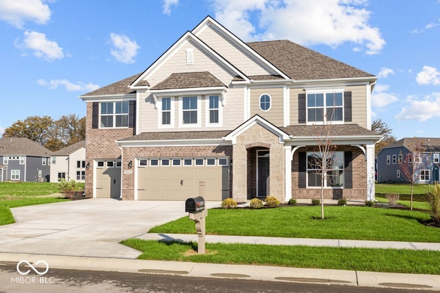 view of front facade with a front yard and a garage