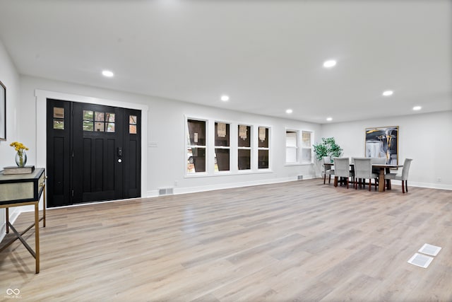 foyer entrance featuring light hardwood / wood-style floors