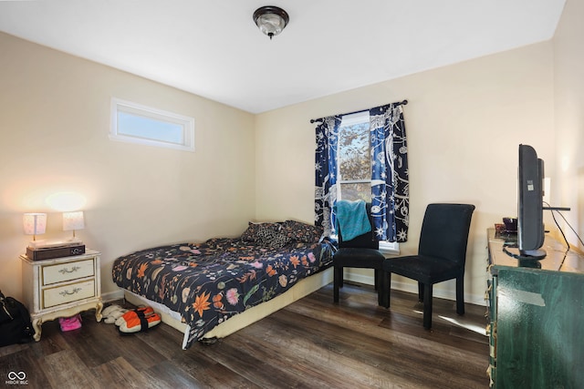 bedroom featuring dark wood-type flooring