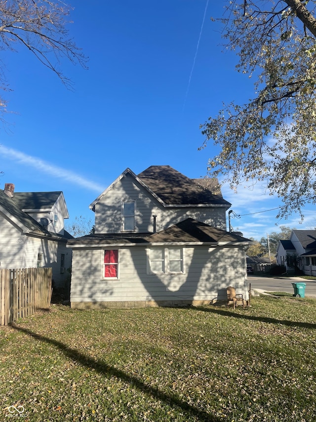 view of home's exterior featuring a yard