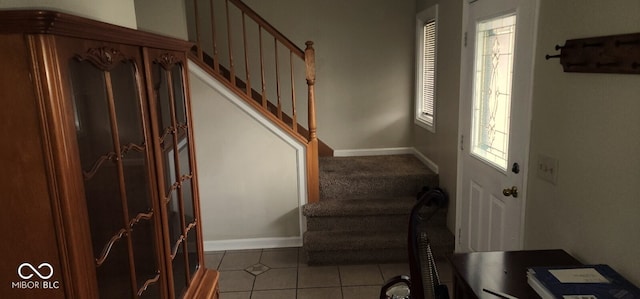 entryway featuring light tile patterned flooring