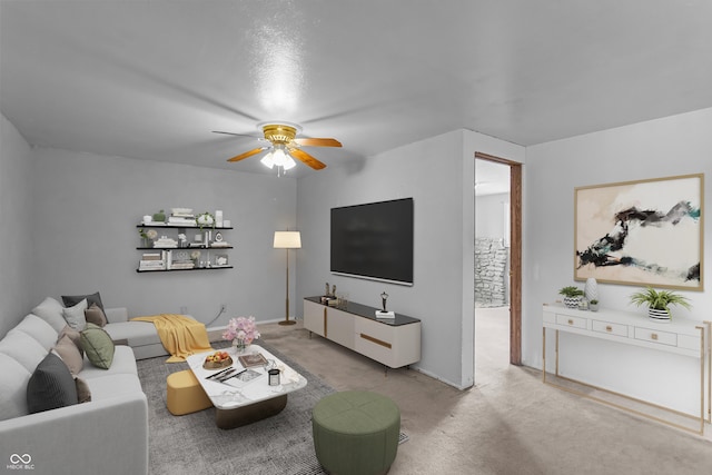 living room featuring light colored carpet and ceiling fan