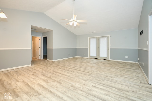 empty room with light wood-type flooring, ceiling fan, and lofted ceiling