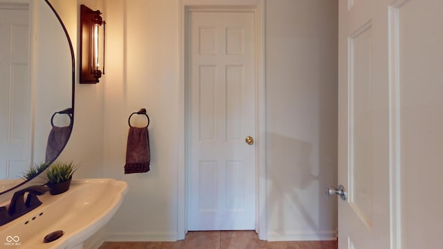 bathroom featuring tile patterned flooring