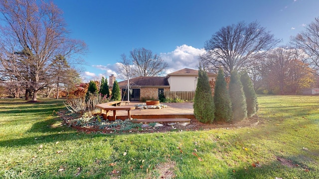 view of yard featuring a deck