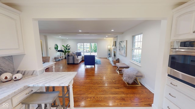 dining area with wood-type flooring