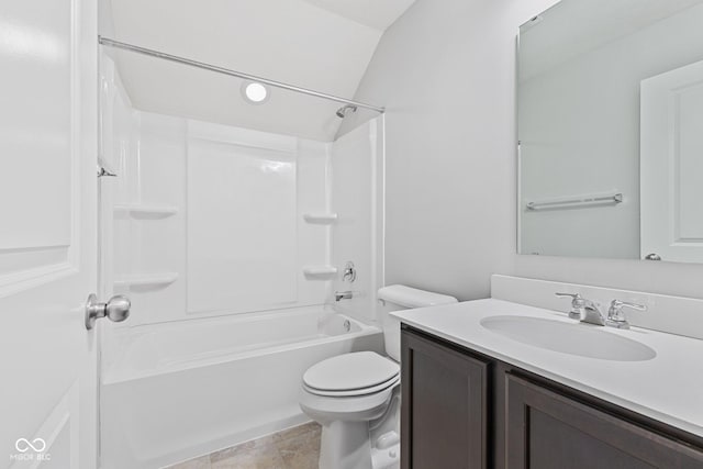 full bathroom featuring vanity,  shower combination, toilet, and lofted ceiling