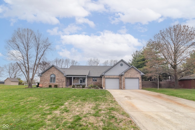 single story home with a front yard and a garage