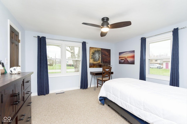 bedroom featuring carpet flooring and a ceiling fan