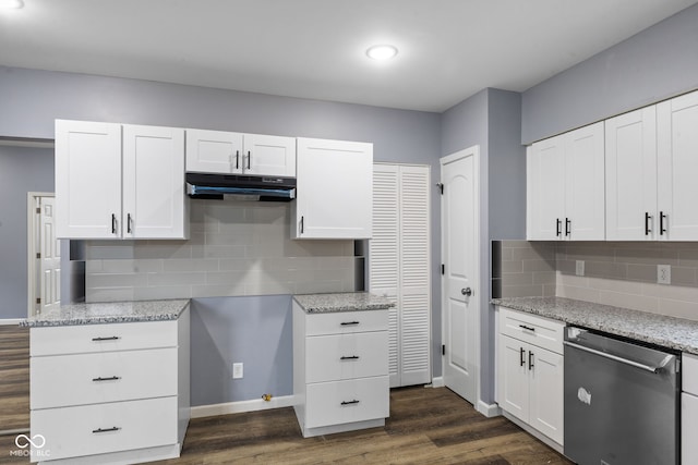 kitchen with light stone countertops, dark hardwood / wood-style flooring, white cabinets, tasteful backsplash, and dishwasher