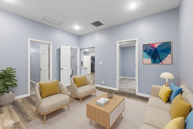 living room with hardwood / wood-style flooring