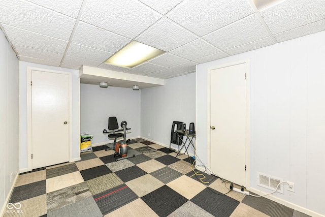 exercise area with a drop ceiling