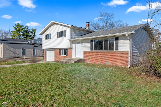 split level home with a garage and a front yard