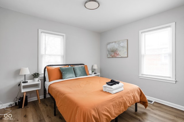 bedroom featuring hardwood / wood-style floors