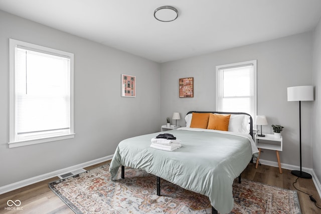 bedroom featuring hardwood / wood-style floors