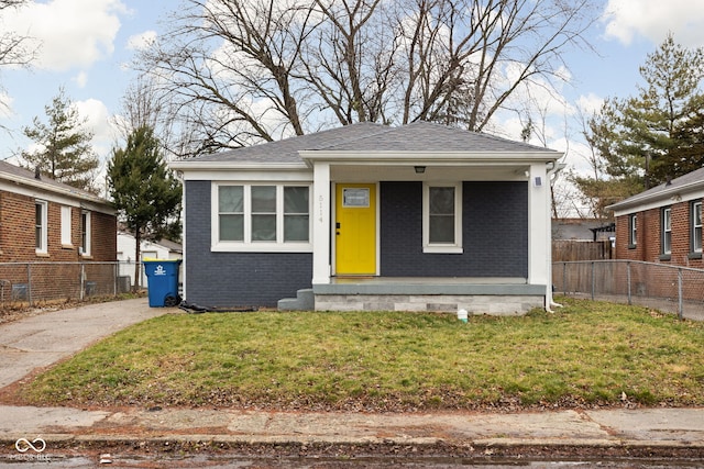 bungalow with a front yard