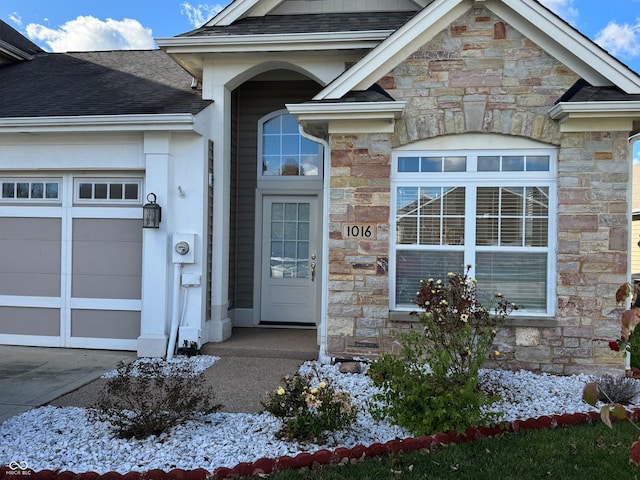 entrance to property with a garage