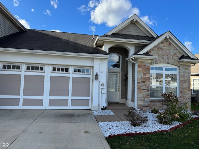 view of front of home with a garage