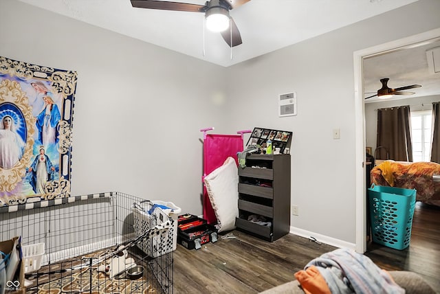 interior space featuring dark hardwood / wood-style floors and ceiling fan