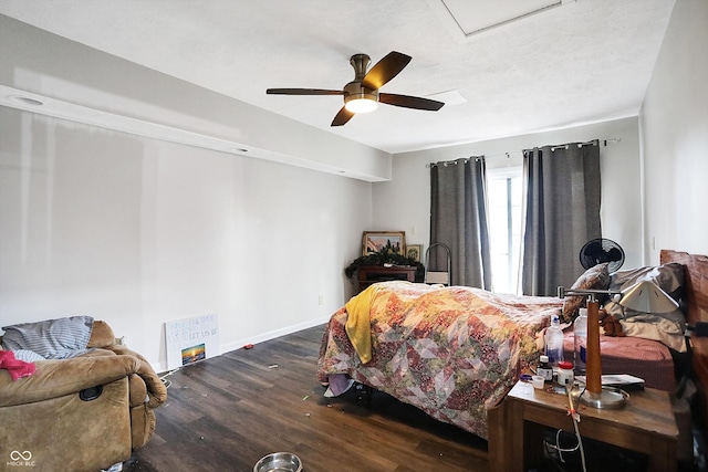 bedroom featuring dark hardwood / wood-style floors and ceiling fan