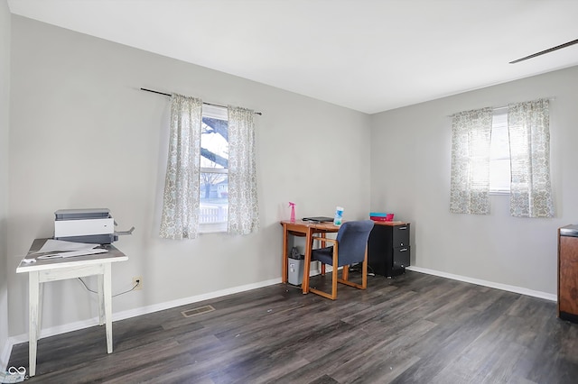 office space with dark hardwood / wood-style floors