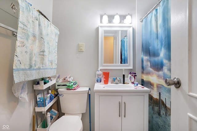 bathroom with vanity and toilet