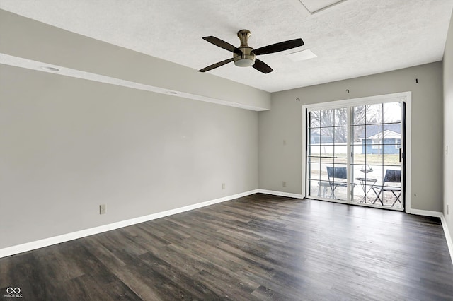 8902 Carla Dr, Indianapolis, IN 46219 - unfurnished room featuring ceiling fan, dark wood-type flooring, and a textured ceiling