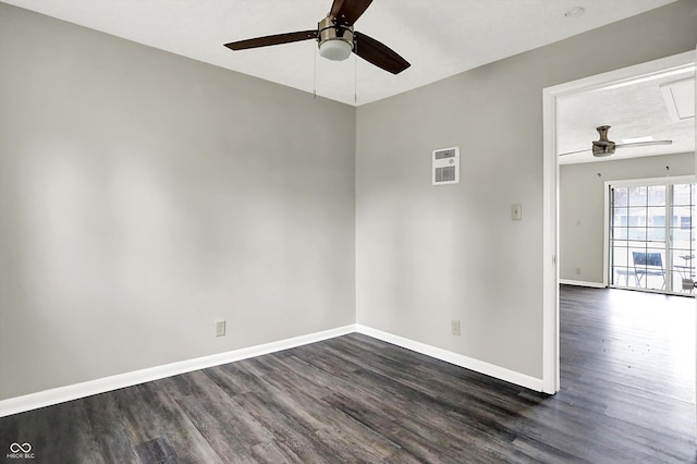 8902 Carla Dr, Indianapolis, IN 46219 - spare room with dark wood-type flooring and ceiling fan