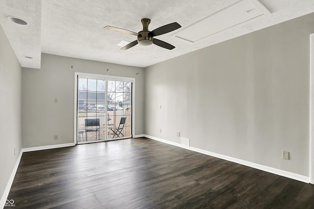 8902 Carla Dr, Indianapolis, IN 46219 - empty room featuring ceiling fan, dark hardwood / wood-style floors, and a textured ceiling