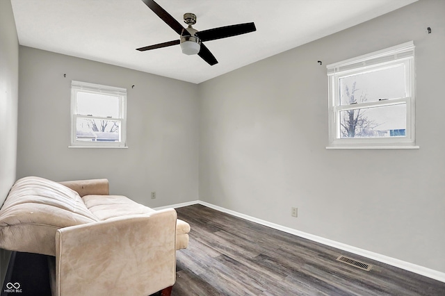 8902 Carla Dr, Indianapolis, IN 46219 - living area featuring dark hardwood / wood-style floors and ceiling fan