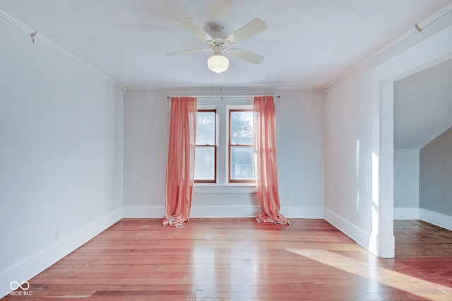 spare room with ceiling fan, light hardwood / wood-style floors, and ornamental molding