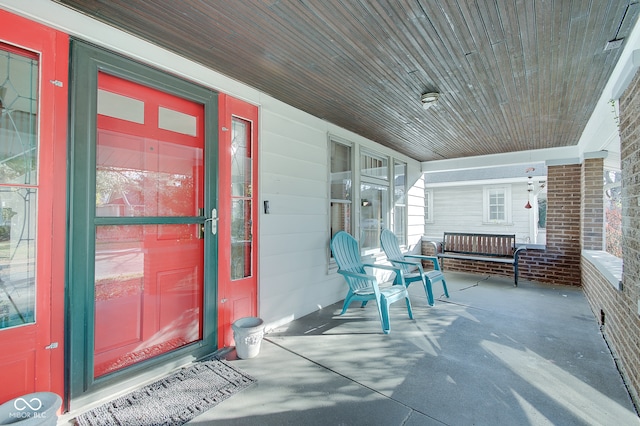 view of patio featuring a porch