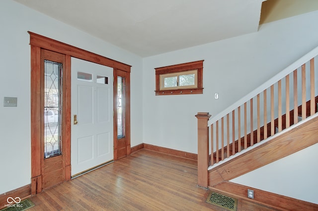 entrance foyer with hardwood / wood-style flooring