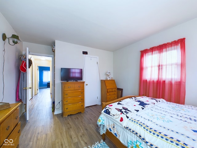 bedroom featuring hardwood / wood-style floors