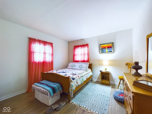 bedroom featuring hardwood / wood-style floors