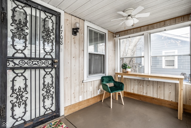 entrance to property featuring ceiling fan