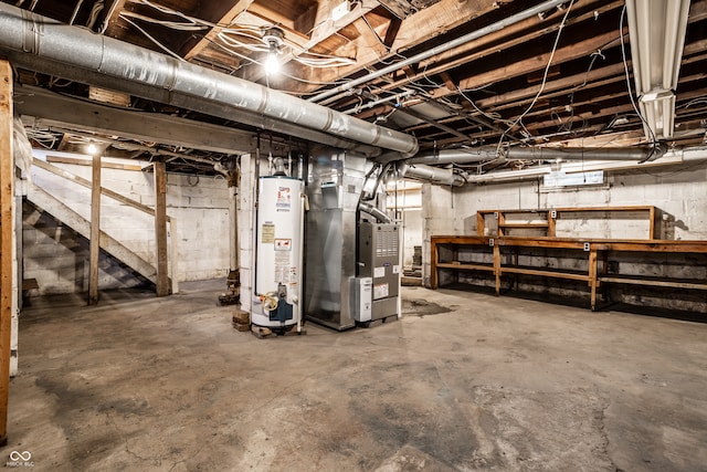 basement featuring gas water heater and heating unit