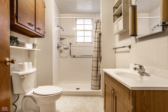 bathroom featuring a shower with curtain, toilet, tile walls, and vanity