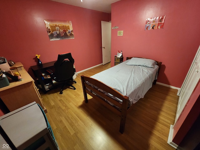 bedroom featuring light hardwood / wood-style floors