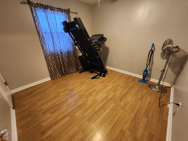 exercise area featuring light wood-type flooring