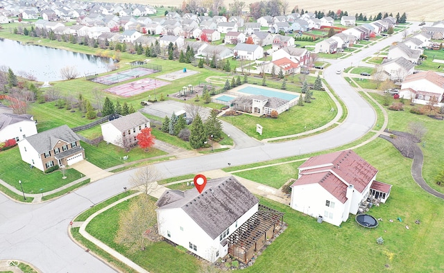 bird's eye view with a water view