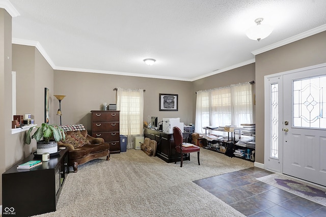 entrance foyer with ornamental molding, a healthy amount of sunlight, a textured ceiling, and dark colored carpet